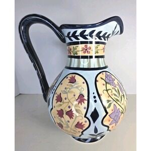 Capriware hand painted Pitcher   3 qt. Capacity. Ceramic. Floral designs.